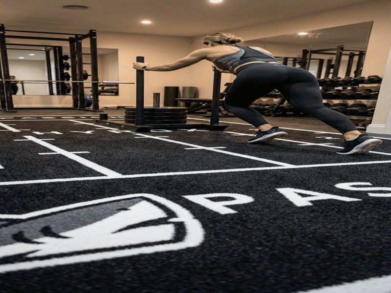 Athlete performing burpees on the turf without skin irritation